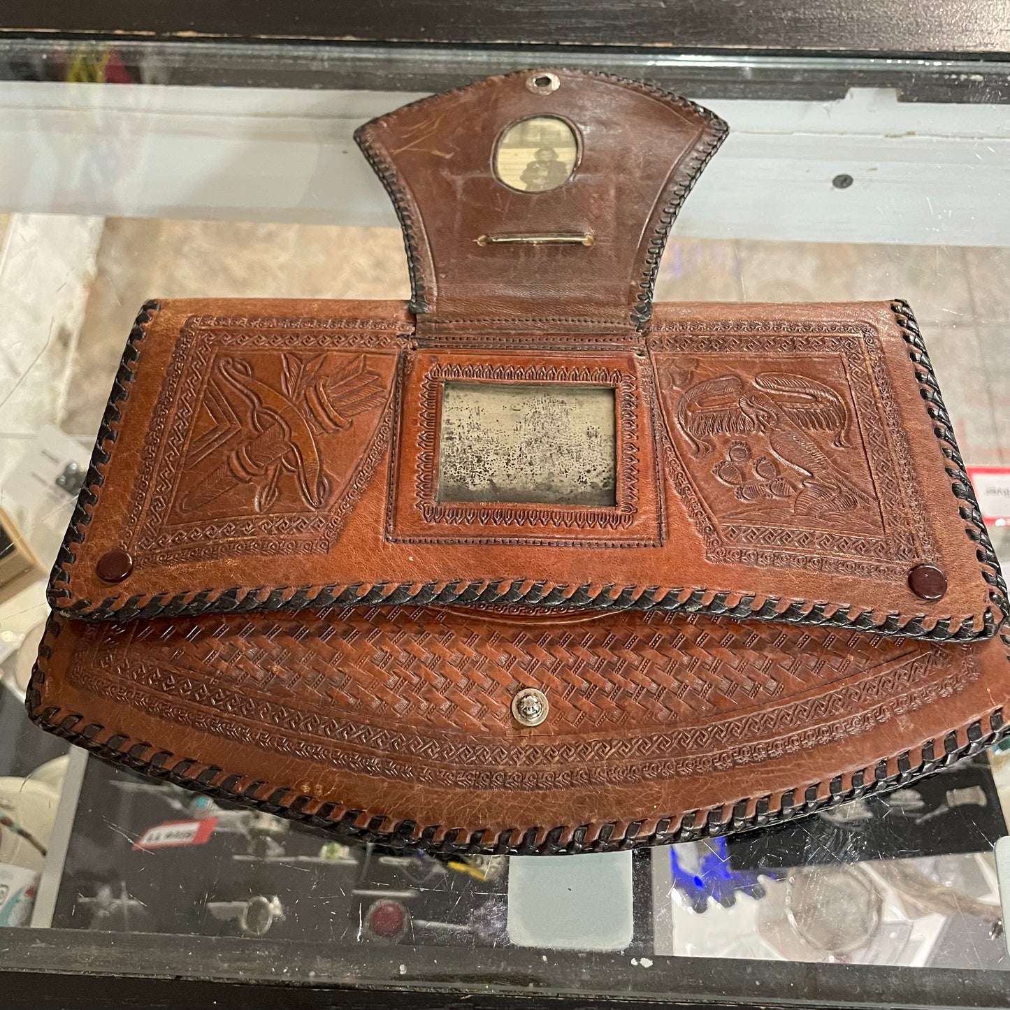 Vintage tooled leather clutch