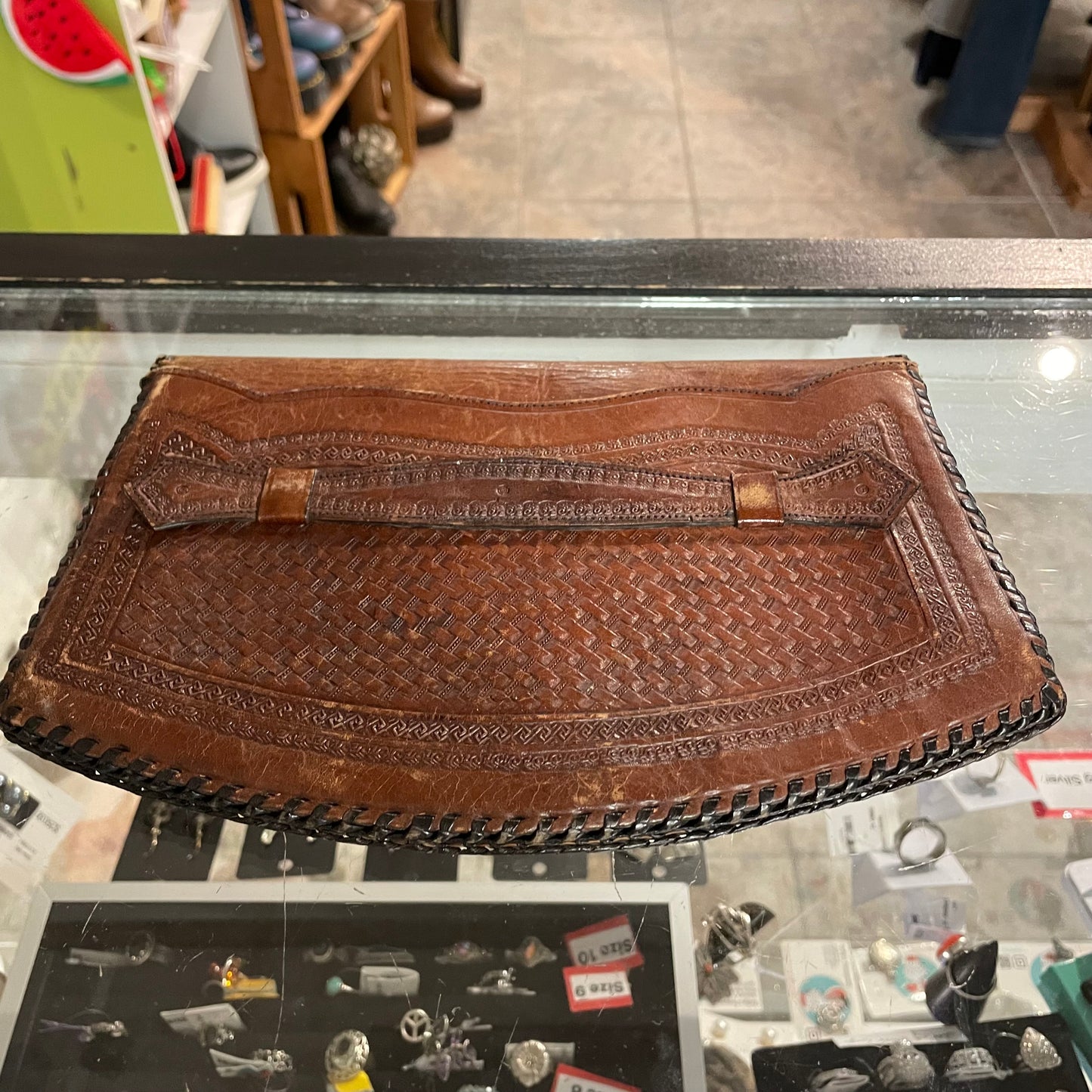 Vintage tooled leather clutch